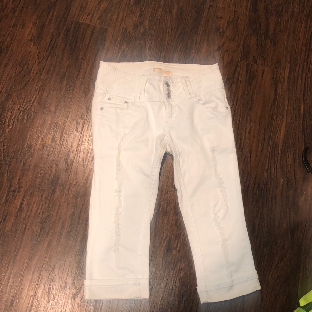 White ripped capris